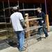 Tom Bianchi and his brother Bob, move a metal rack as they work to clear out the contents of the former Dream Nite Club on Monday morning.  Melanie Maxwell I AnnArbor.com